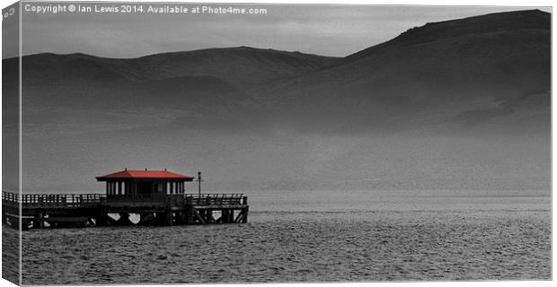 Beaumaris Pier and Snowdonia Canvas Print by Ian Lewis