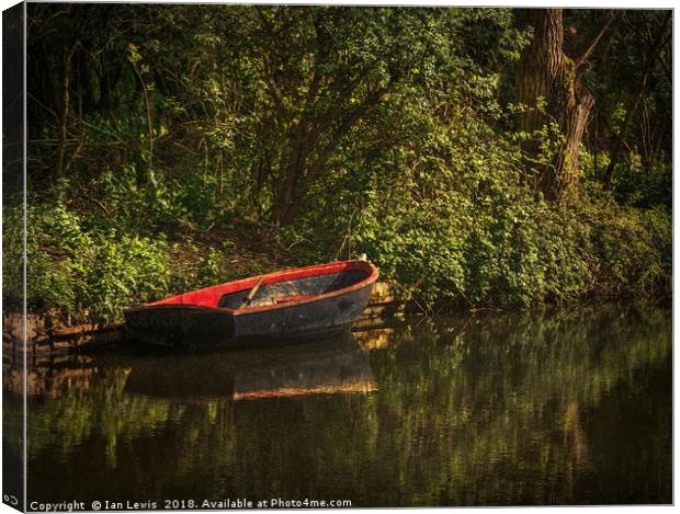 Dinghy On The Oxford Canal Canvas Print by Ian Lewis