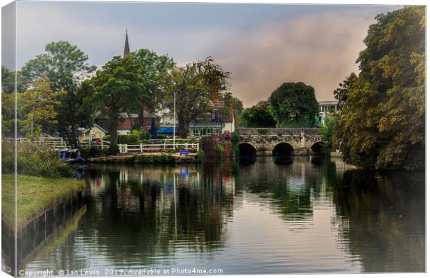 Above The Bridge In Abingdon Canvas Print by Ian Lewis