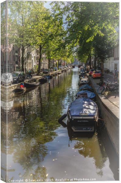A Street In Amsterdam Canvas Print by Ian Lewis