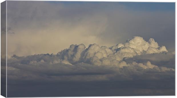 raging clouds Canvas Print by simon plumridge