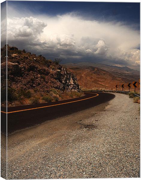 Desert Highway Canvas Print by Paul Fisher