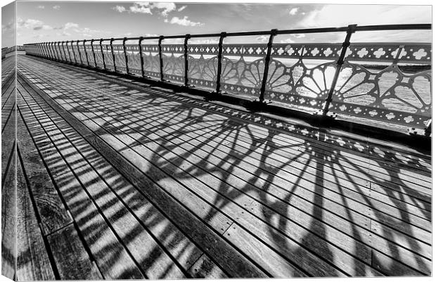  Pier in reflection Canvas Print by Andrew Richards