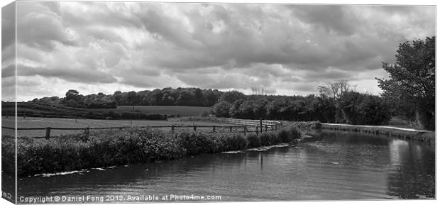 Canal on a cloudy day Black and White Canvas Print by Daniel Fong