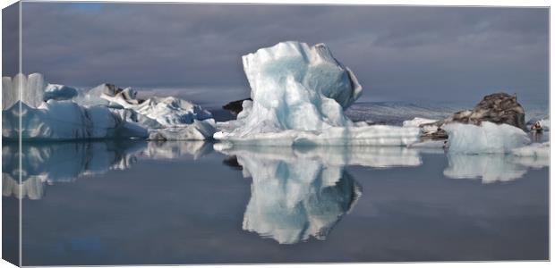 Iceland iceberg reflections panorama Canvas Print by mark humpage