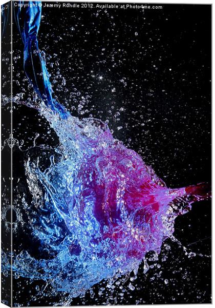 Water filled balloon burst Canvas Print by Jeremy Rundle