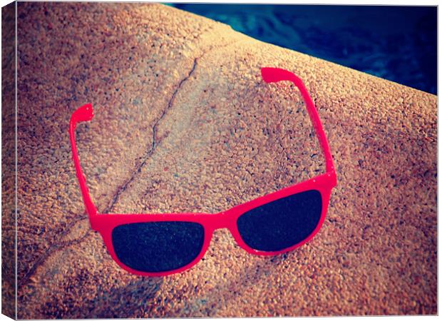 Sunglasses by the pool Canvas Print by Amber-Rose Adkins