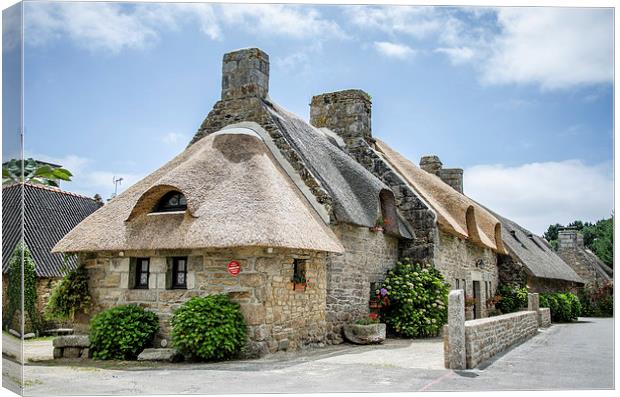 Thatched cottage in Brittany Canvas Print by Michelle PREVOT