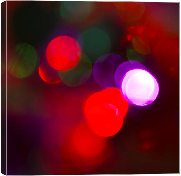 Christmas Bokeh Reds Canvas Print by Michelle Orai