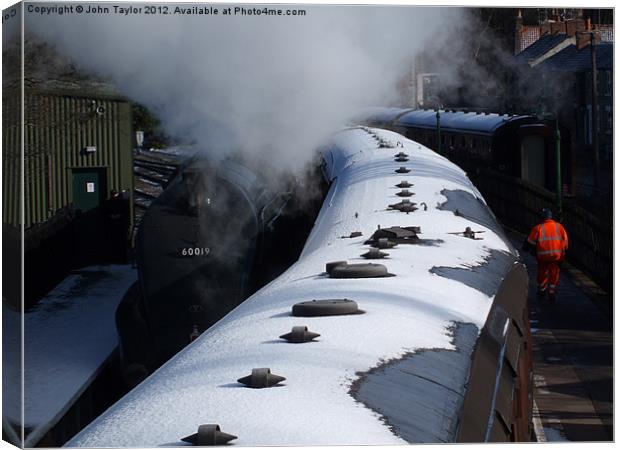 Steam and Snow Canvas Print by John Taylor