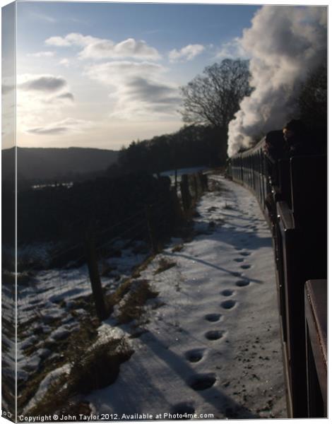 Cumbrian winter steam Canvas Print by John Taylor