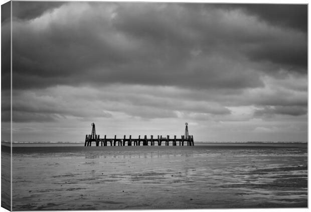 Old Pier under cloud Canvas Print by David McCulloch