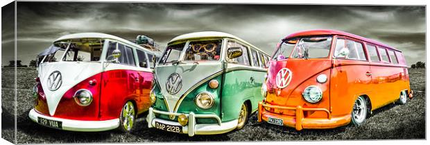 VW camper van trio Canvas Print by Ian Hufton