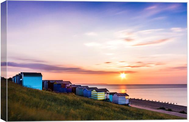 Beach Huts at Sunset Canvas Print by Ian Hufton