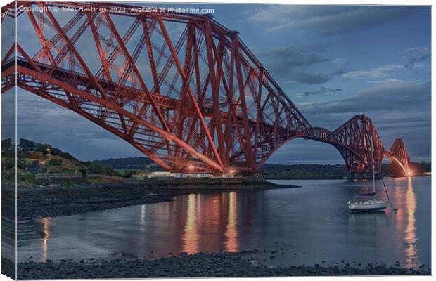 A Fiery Red Span Canvas Print by John Hastings