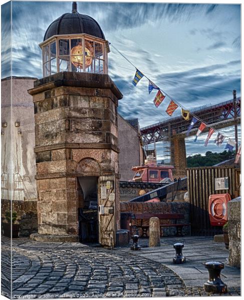 Illuminating North Queensferry Canvas Print by John Hastings