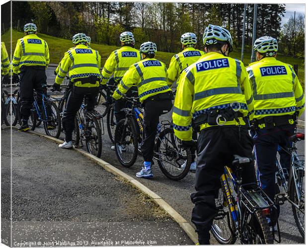 Bike Patrol Canvas Print by John Hastings