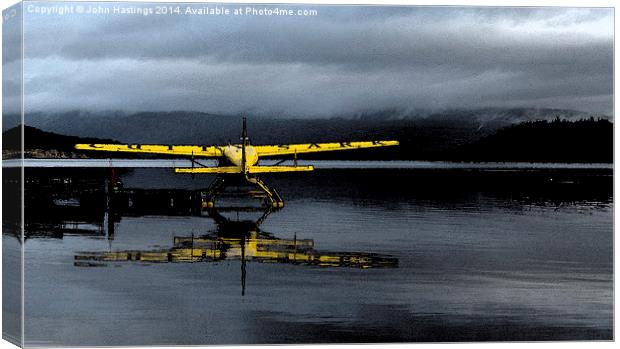 Loch Lomond's Seaplane Adventure Canvas Print by John Hastings