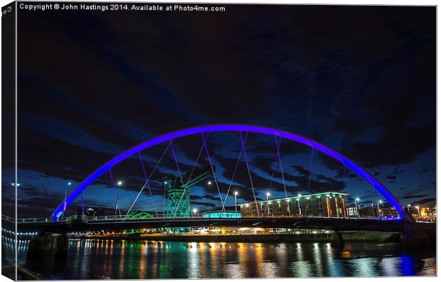 Glasgow's Iconic Squinty Bridge Canvas Print by John Hastings