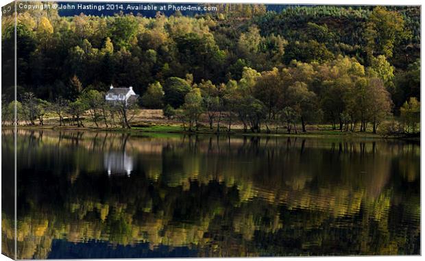 Tranquil Reflections Canvas Print by John Hastings