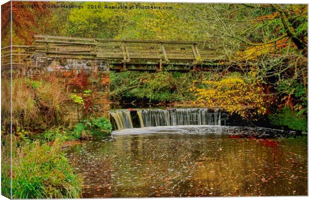 Rustic River Crossing Canvas Print by John Hastings