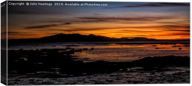 Awe-Inspiring Sunset Over the Isle of Arran Canvas Print by John Hastings