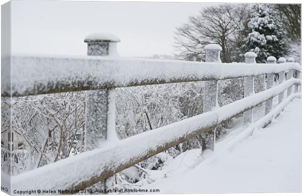 Snow Covered Fence Canvas Print by Helen Northcott