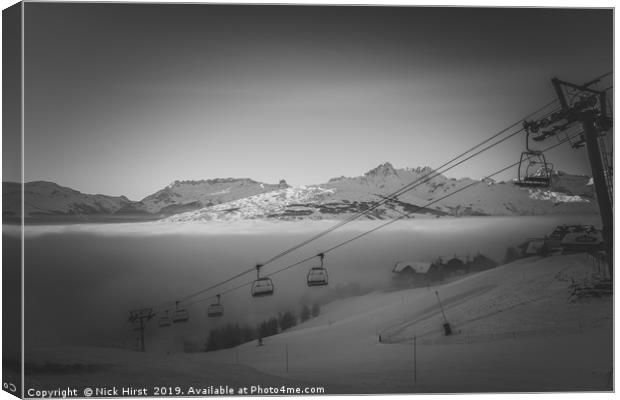 Chairlift rising out if the fog Canvas Print by Nick Hirst