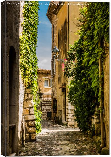 An Alley In Saint Paul de Vence, South of France. Canvas Print by Maggie McCall