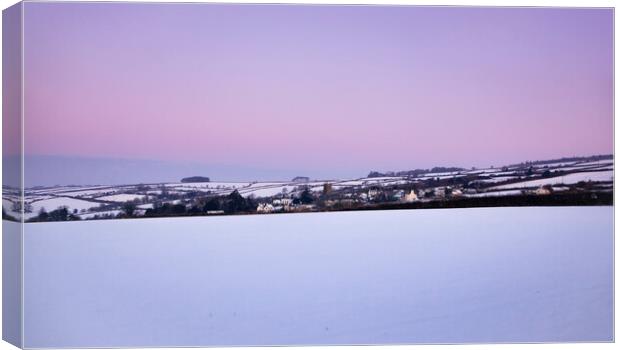  A snowy Dawn, Milton Abbot, Tavistock, Devon. Canvas Print by Maggie McCall