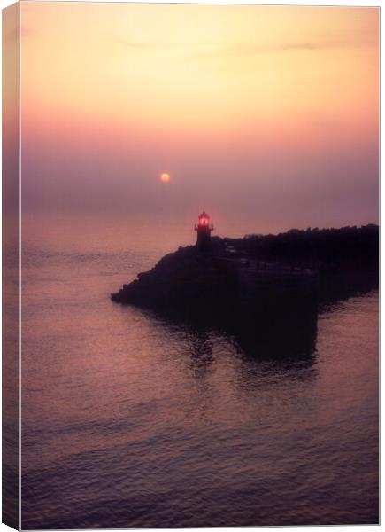 Calais Lighthouse and Breakwater. Canvas Print by Maggie McCall