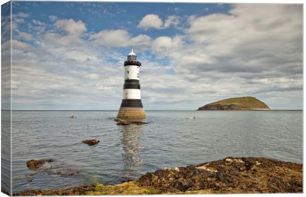 PENMON POINT LIGHTHOUSE Canvas Print by raymond mcbride