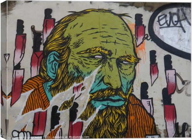 Graffiti showing an old man, London, UK. Canvas Print by Luigi Petro