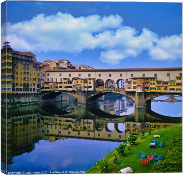 Ponte Vecchio over river Arno in Florence, Italy. Canvas Print by Luigi Petro