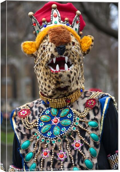 Masked participant in the New Year Parade in London, UK. Canvas Print by Luigi Petro