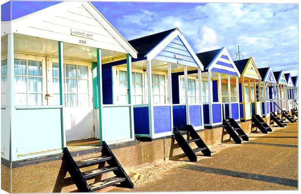  Southwold bright beach huts Canvas Print by Sue Bottomley