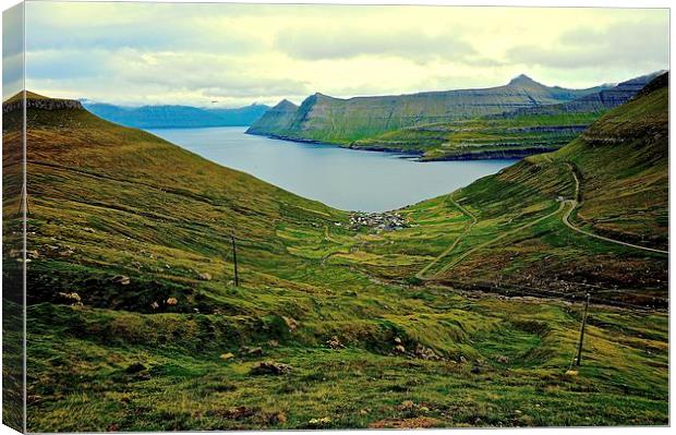 Mountains and sea in the Faroe Islands  Canvas Print by Sue Bottomley