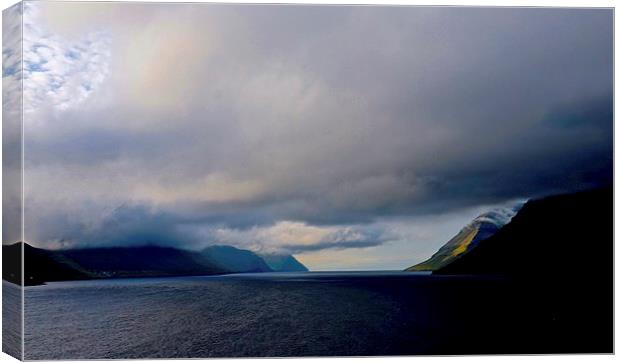 Leaving the Faroe Islands by Sea  Canvas Print by Sue Bottomley