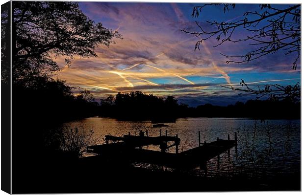  Sunrise over boating lake Canvas Print by Sue Bottomley