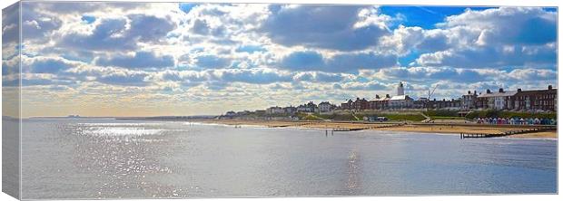 Southwold, beach, beach huts and town  Canvas Print by Sue Bottomley
