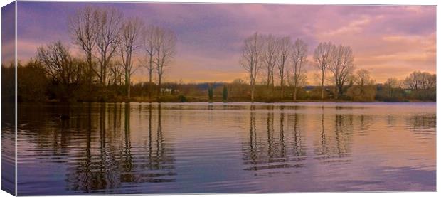  Sunset across the lake                            Canvas Print by Sue Bottomley