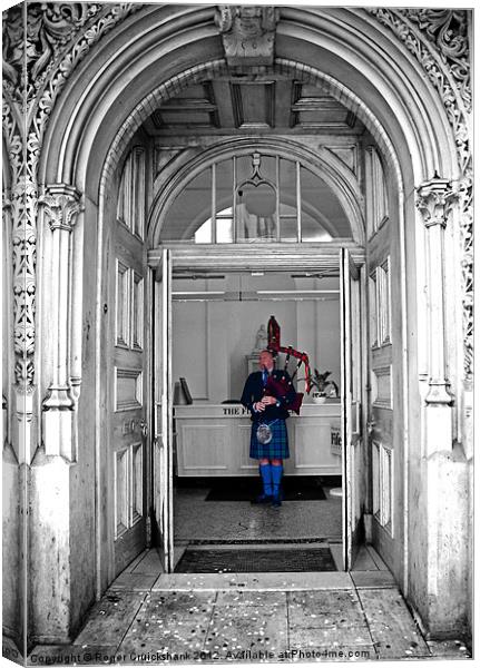 The Lone Piper Canvas Print by Roger Cruickshank