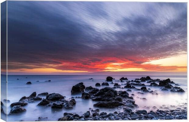 Red sunset seascape Canvas Print by Phil Crean