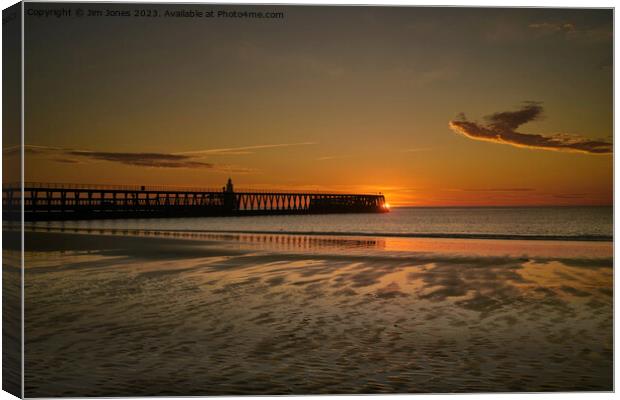 January Sunrise at the end of the pier Canvas Print by Jim Jones
