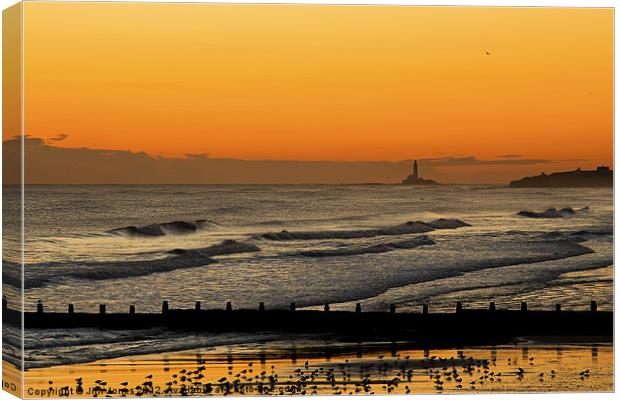 Golden Sunrise Over Silvery Waves Canvas Print by Jim Jones