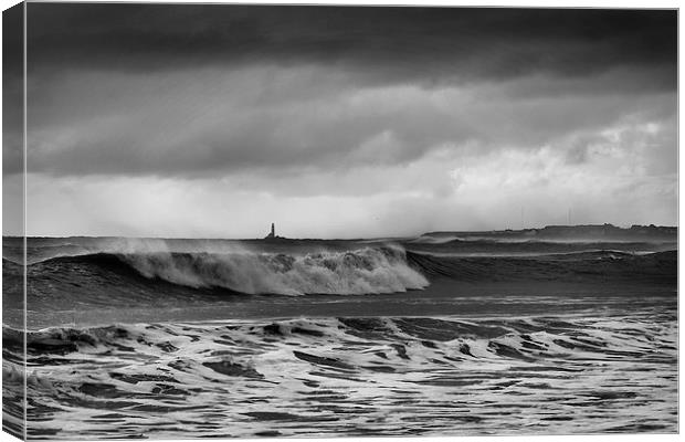 Rough sea and stormy sky Canvas Print by Jim Jones