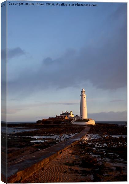 St Mary's Island and lighthouse. Canvas Print by Jim Jones
