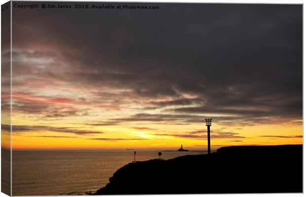 Beacon silhouetted against a dawn sky Canvas Print by Jim Jones