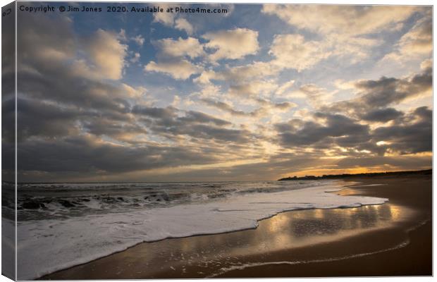 Daybreak on the beach Canvas Print by Jim Jones