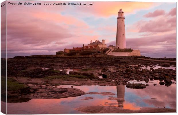 St Mary's Island under a pastel sky Canvas Print by Jim Jones